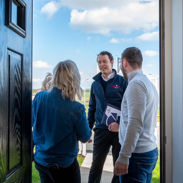 Goodwins Removals & Storage team unloading household items at a new home in Staffordshire.